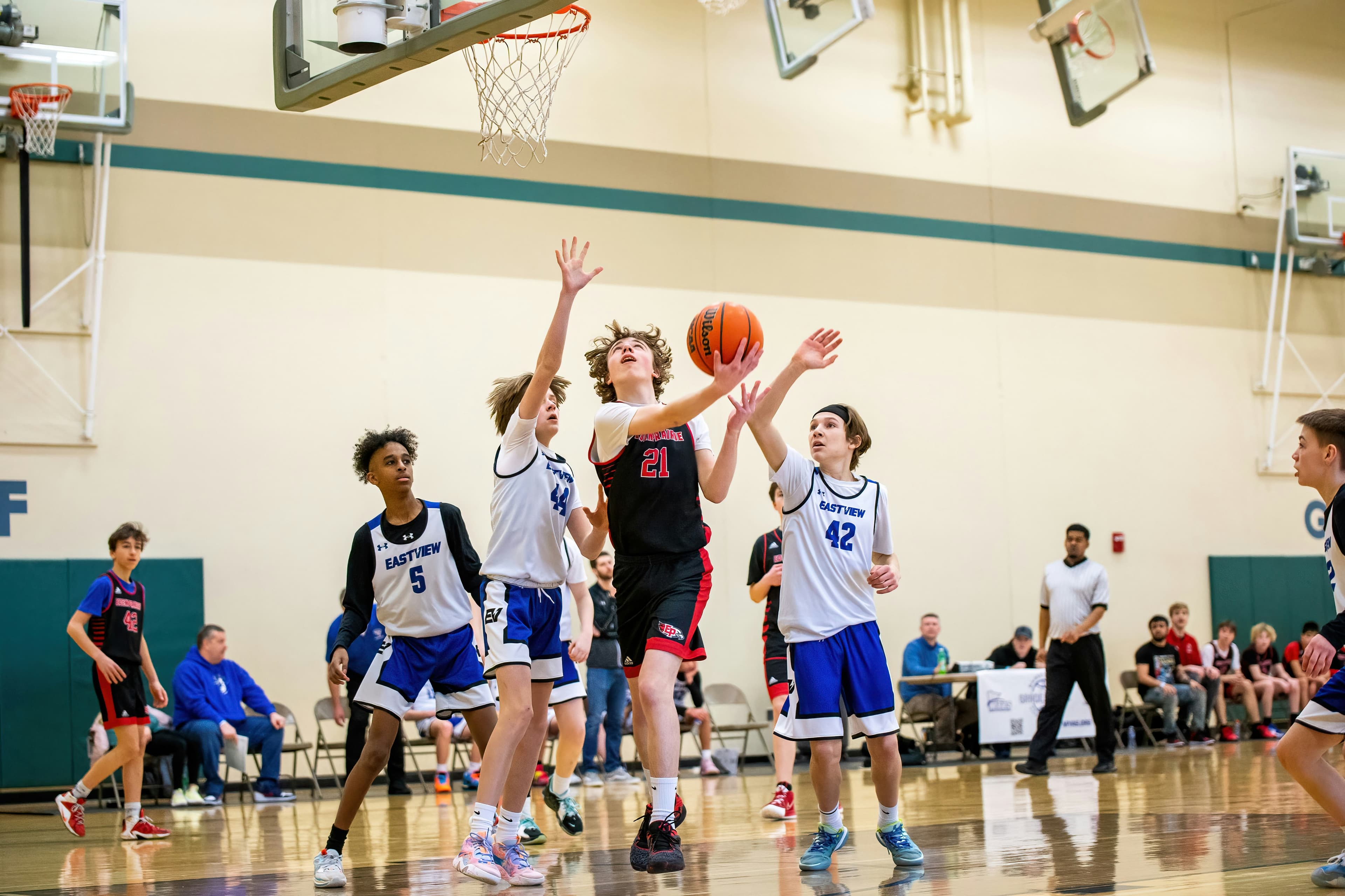 Kids enjoying a youth basketball camp in Calgary run by Vision Elite Academy