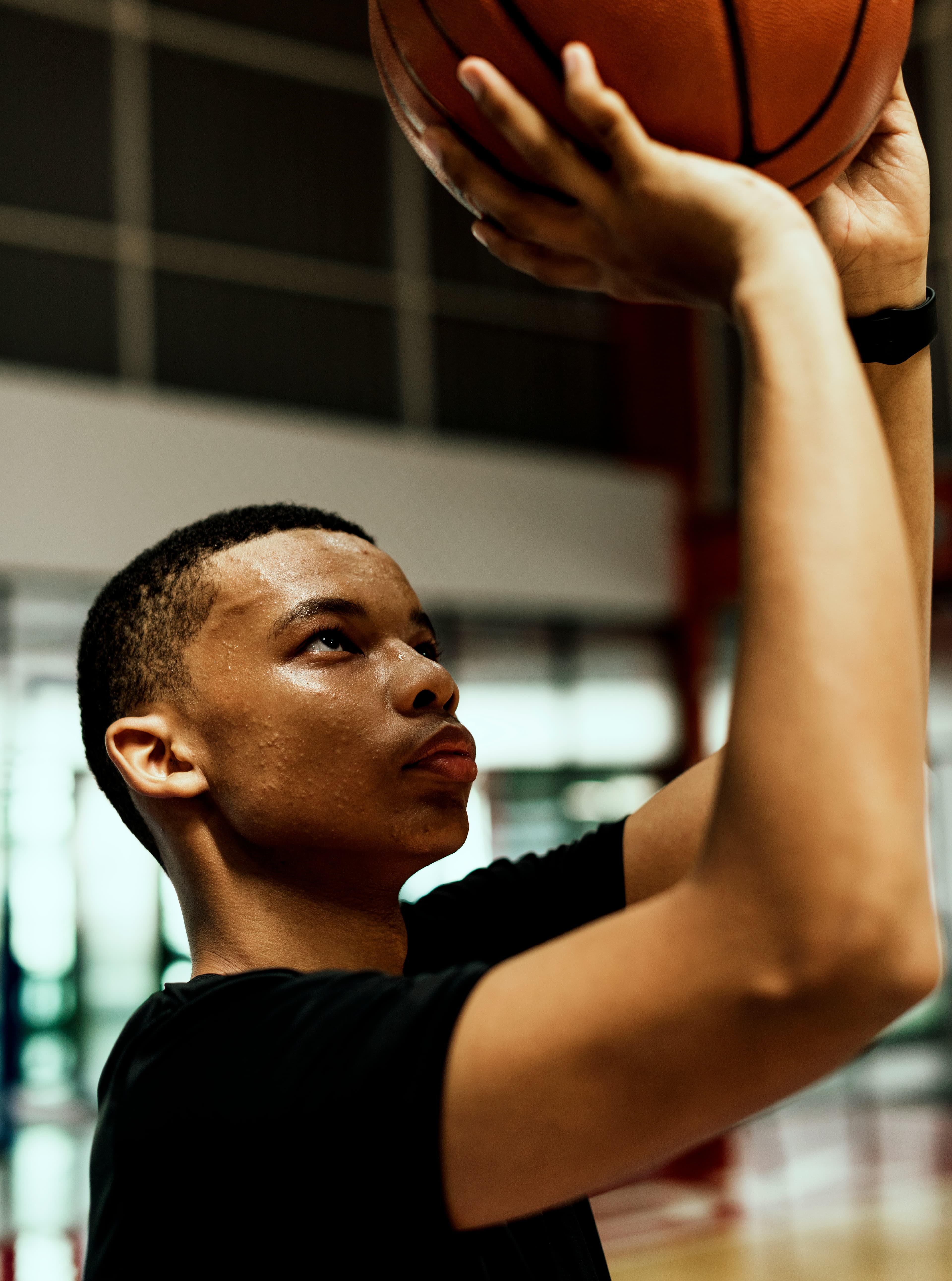 Athlete elevating for a layup during Calgary basketball training